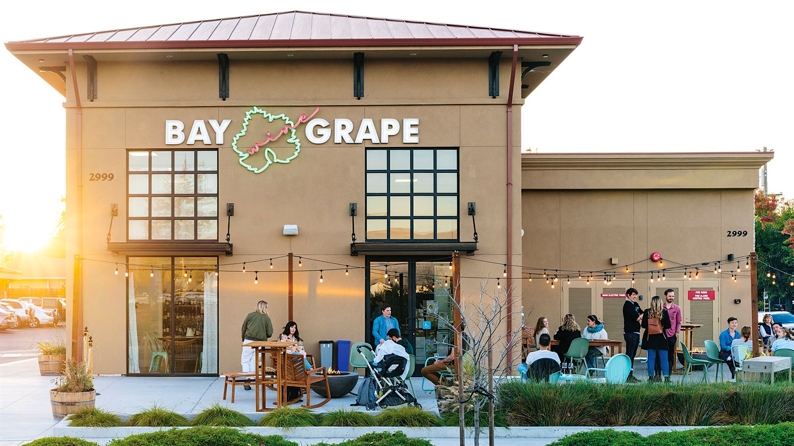 Bay Grape Napa, with several guests enjoying themselves on the front patio